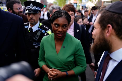Conservative leader Kemi Badenoch speaking to Jewish people near the scene of the attack.