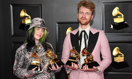 Billie Eilish and FINNEAS, winners of Record of the Year for ‘Everything I Wanted’ and Best Song Written For Visual Media for “No Time To Die”, pose in the media room during the 63rd Annual GRAMMY Awards at Los Angeles Convention Center on March 14, 2021 in Los Angeles, California