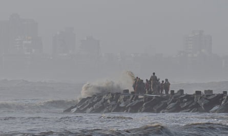 High tide waves hit the Arabian Sea coast at Juhu Koliwada in Mumbai, India