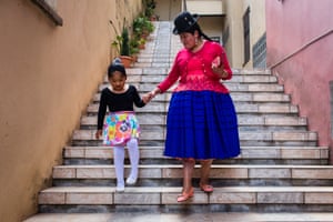 Celia Ramos, 34, walking with her daughter after a ballet class in La Paz. Celia has been working in the same house as a maid since she was 14 years old. She says that her bosses has given her a life that she would otherwise never have had by letting her study and giving her a more comfortable life than she could ever imagine. But she dreams of bigger opportunities for her daughter and is making everything possible for her to get it, by making her study dance ballet, learn chess and study in a good school