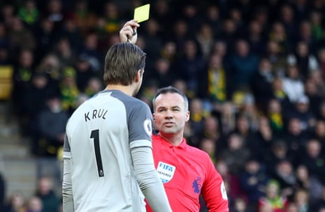 Referee Paul Tierney issues Krul a yellow card.