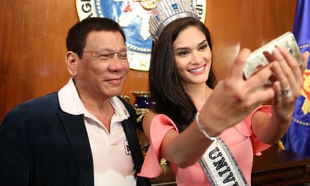 Iron rod … President Rodrigo Duterte (left) meets Miss Universe