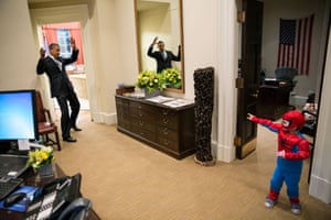 This is the photograph that defines Obama's agile personality and his rapport with kids, as he spontaneously plays the villain to a three-year-old Spiderman.