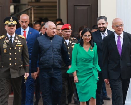 Diosdado Cabello pictured with Delcy Rodríguez as she is sworn in as Venezuela’s interim president, with her brother, Jorge, to her right.