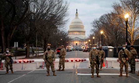 Members of the National Guard stand watch at the US Capitol