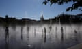 SPAIN-CLIMATE-WEATHER-HEATWAVE<br>People cool off at a fountain in the Madrid Rio park amid heatwave conditions in Madrid on July 23, 2024. July 21, 2024 was the hottest day ever registered globally, according to preliminary data published on July 23, 2024 by the EU's climate monitor. The Copernicus Climate Change Service (C3S) said the global average surface air temperature on July 21 was 17.09 degrees Celsius, a fraction above the previous record set in 2023. (Photo by OSCAR DEL POZO / AFP) (Photo by OSCAR DEL POZO/AFP via Getty Images)
