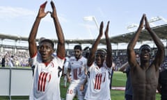 FBL-FRA-L1-TOULOUSE-LILLE<br>Lille’s Ivorian forward Nicolas Pepe, Lille’s Malian forward Yves Bissouma and Lille’s Moroccan defender Hamza Mendyl celebrates their 3-2 win against Toulouse at the end of the French L1 football match Toulouse against Lille on May 6, 2018 at the Municipal Stadium in Toulouse, southern France. / AFP PHOTO / Pascal PAVANIPASCAL PAVANI/AFP/Getty Images