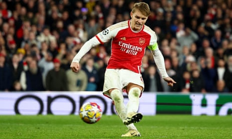 Arsenal's Martin Odegaard scores a penalty during the shoot-out.