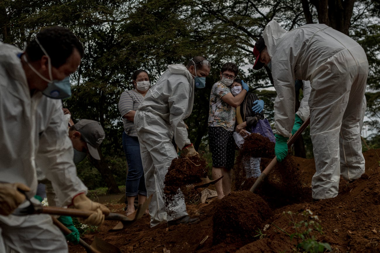 Brazilian gravediggers at work at Vila Formosa. Paulo Lotufo, a University of São Paulo epidemiologist, hailed gravediggers as the unsung heroes of the pandemic.