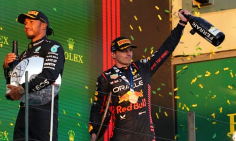 Red Bull driver Max Verstappen of Netherlands (right) and Mercedes driver Lewis Hamilton of Britain celebrate on the podium