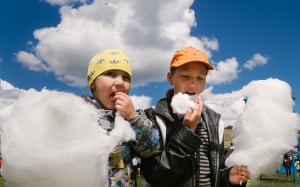 Children eating cotton candy