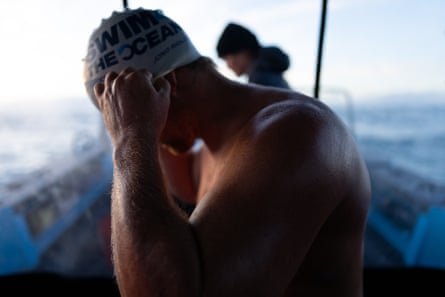Ridler in a swimming cap on a boat