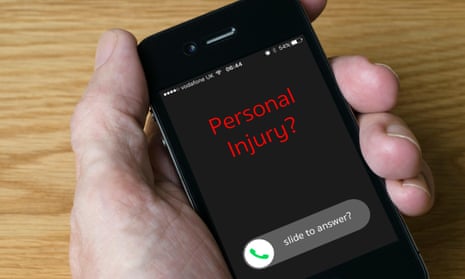 A 'personal injury' message pops up on a mobile phone