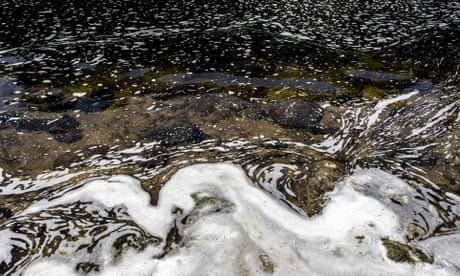 PFAS foam gathers at the the Van Etten Creek dam in Oscoda township, Michigan, near Wurtsmith Air Force Base.