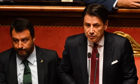 Italian premier Giuseppe Conte addresses the Senate in Rome, flanked by deputy-premier Matteo Salvini.