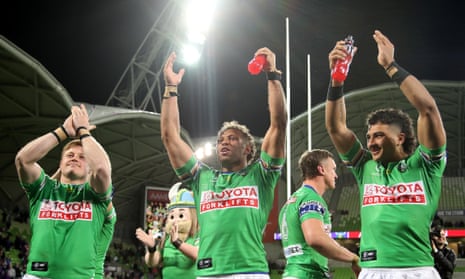 The Canberra Raiders celebrate their upset 28-20 victory over the Melbourne Storm in the NRL elimination final at AAMI Park.