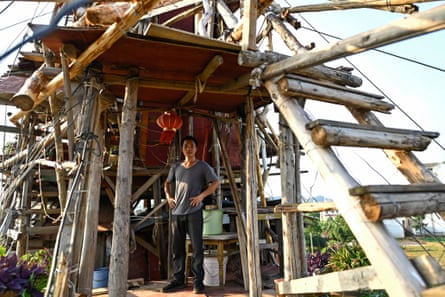Chen Tianming in his house labelled China’s strangest ‘nail house’ – households that refuse to move in the face of development plans.