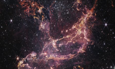 Part of the James Webb space telescope image showing NGC 346, a young cluster of stars in the Small Magellanic Cloud.