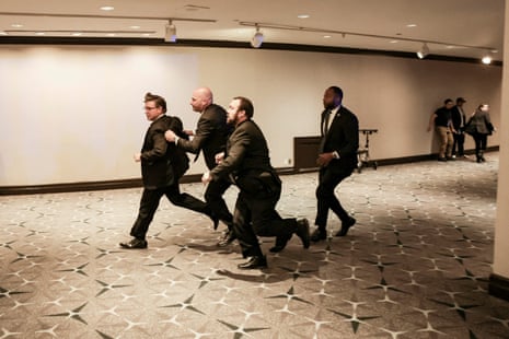 Mike Johnson is evacuated during the press dinner