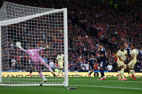Lawrence Shankland first time finish flies into the Curaçao net and gives Scotland the lead.