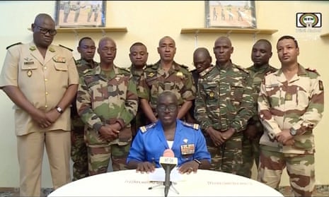 Niger Army spokesman Colonel Amadou Adramane speaks during an appearance on national television, after President Mohamed Bazoum was held in the presidential palace.