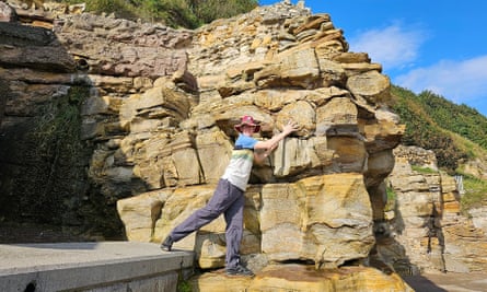 Liam Herringshaw searches for fossils.