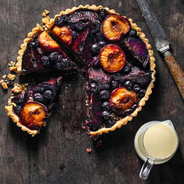 Use your seasonal fruit in this plum, blueberry and walnut tart