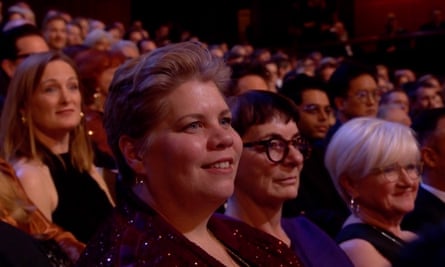 Screengrab showing Katy Brand watching the performance.