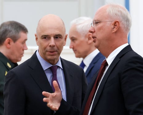 Russian finance minister Anton Siluanov and Russian Direct Investment Fund CEO and Special Presidential Representative for Investment and Economic Cooperation with Foreign Countries, Kirill Dmitriev, speak with each other before a meeting chaired by the Russian president in preparation for the upcoming Russia-US summit in Alaska, at the Kremlin in Moscow, Russia.