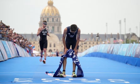 Britain’s Alex Yee suffers after his incredible finish to win Olympic gold in Paris.