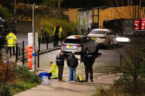 Police and other emergency responders attend to Huntingdon Station