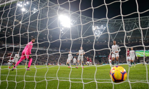 Alisson and the Liverpool defence can only watch as Michail Antonio equalises for West Ham.