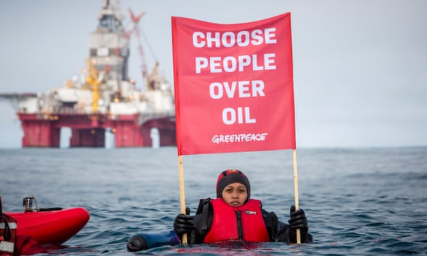 A Greenpeace protester opposing the Statoil Songa Enabler oil rig north of the Norwegian coast.