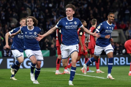 Maximilian Grosser celebrates scoring the decider against Leverkusen as Maël Corboz wheels away with him