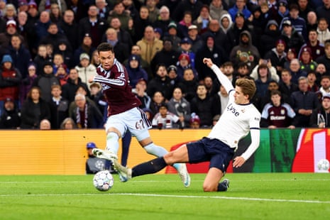 Aston Villa’s Alysson Edward kicks the ball as a Viking defender slides in to block