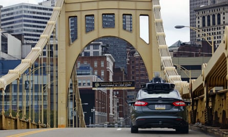 A self-driving Uber in downtown Pittsburgh. The company sees a future in which human drivers are replaced by autonomous vehicles.