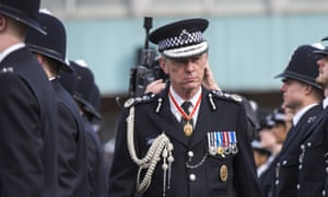 Met commissioner Sir Bernard Hogan-Howe inspecting police recruits.