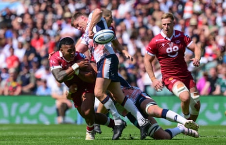 Manu Tuilagi of Sale Sharks is tackled by Owen Farrell of Saracens and has the ball ripped during the Gallagher Premiership Rugby final .