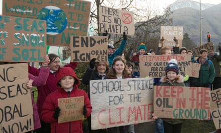 Holly Gillibrand (centre) leading a climate protest in Fort William.
