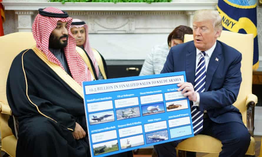 Donald Trump holds a defence sales chart with Saudi Arabia’s Crown Prince Mohammed bin Salman