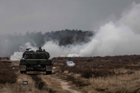 Polish and Ukrainian soldiers train on a Leopard 2 tank at the Świętoszów military base.
