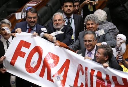 Members of Brazil’s lower house celebrate the vote against Eduardo Cunha.