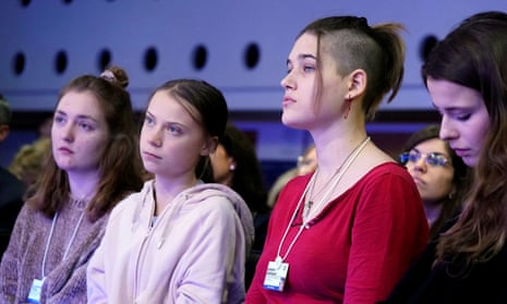 Swiss activist Loukina Tille, Swedish climate change activists Greta Thunberg and Isabelle Axelsson attend the World Economic Forum annual meeting in Davos, Switzerland.