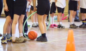 Children’s feet in sports hall