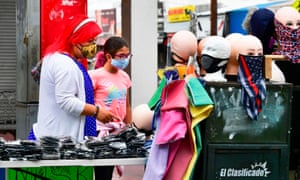 People shop for face-coverings in Los Angeles, California.
