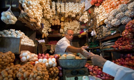 A shop selling garlic, onions and potatoes in Mumbai