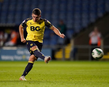 Oxford’s Cameron Brannagan scores a penalty.