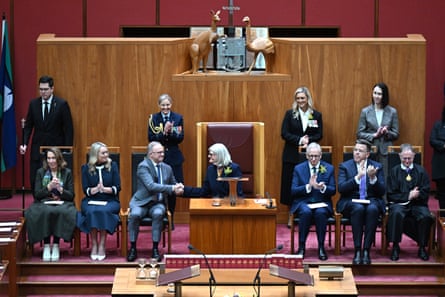 Governor-General of Australia Sam Mostyn shakes hands with Australian Prime Minister Anthony Albanese during the swearing in ceremony in the Senate chamber at Parliament House in Canberra