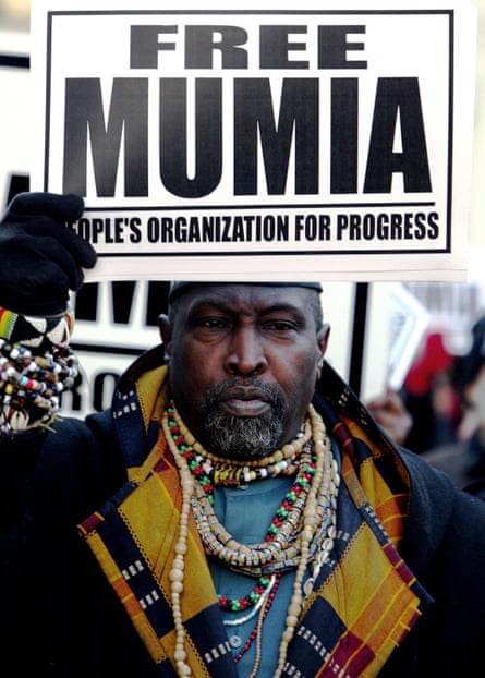A supporter of inmate Mumia Abu-Jamal outside City Hall in Philadelphia, in 2006.
