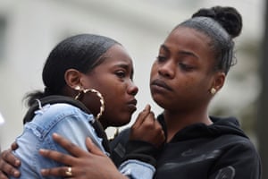 Stephanie Goulsby, whose boyfriend Fred Williams Jr was shot by sheriff’s deputies, is comforted by Taniko Anderson at a news conference outside sheriff’s department headquarters in Los Angeles.